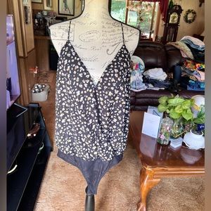 Woman’s super cute cheetah print bodysuit